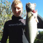 Braving the big surf: Dylan with a decent Shad shore dive South