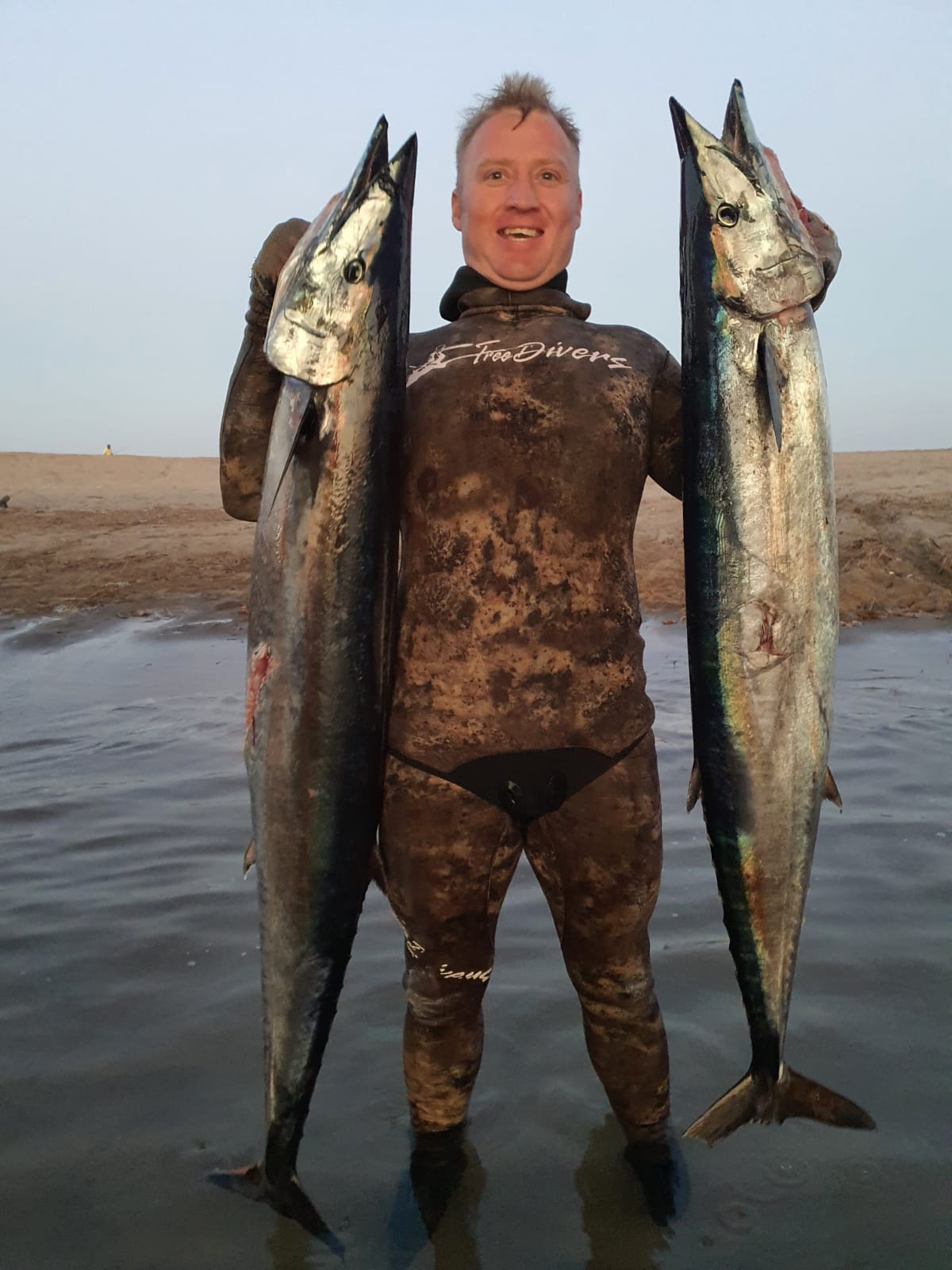 Master Richardt Botes with a lovely brace of Wahoo boat dive South